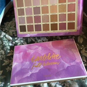 Tart Full Bloom eyeshadow palette inbox with just a few colors swatched.